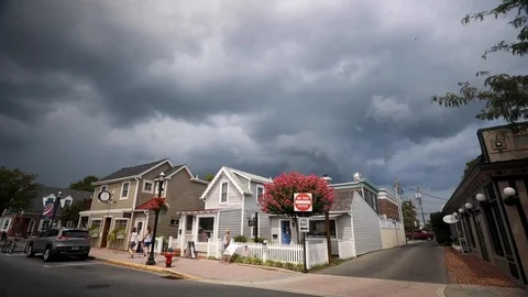 Storm clouds loom over Lewes, Delaware Stock Footage 114674716