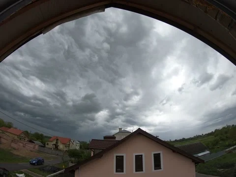 Storm clouds making amaizing figures in grey sky Stock Footage 145016617