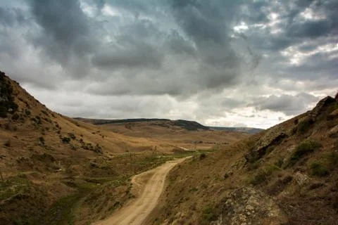 Storm clouds in the mountains Stock Photos