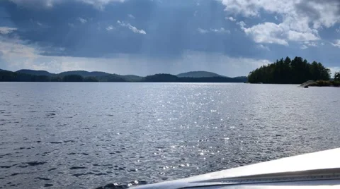 Storm clouds move in over lake time lapse Stock Footage 43311768