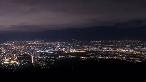 Storm Clouds Moving Over Night Cityscape Of Chiang Mai, Thailand 4K Time Lapse Stock Footage 69883388