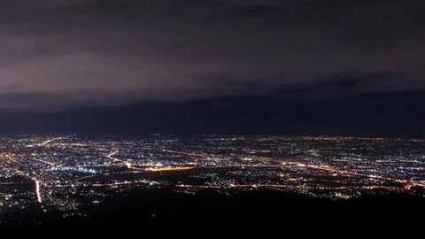 Storm Clouds Moving Over Night Cityscape Of Chiang Mai, Thailand 4K Time Lapse Stock Footage 69885569