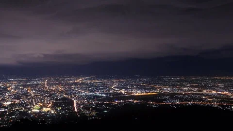 Storm Clouds Moving Over Night Cityscape Of Chiang Mai, Thailand 4K Time Lapse Stock Footage 69885996