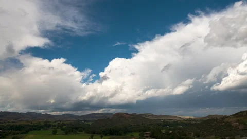 Storm Clouds Moving Through the Mountains Stock Footage 272726716