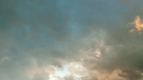 Storm Clouds Moving TimeLapse with Cloudy Landscape and sun shining through it. Stock Footage 209559149