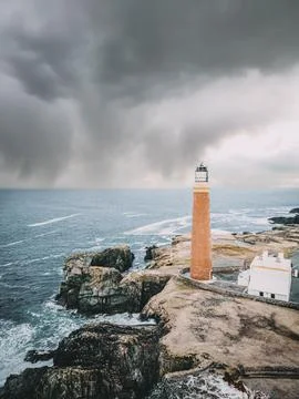 Storm clouds over Butt of Lewis Lighthouse on the Isle of Lewis, Outer Hebrides Stock Photos