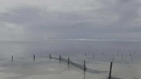 Storm Clouds Over Calm Caribbean Water in Caye Caulker Belize Vídeos de archivo 335169850