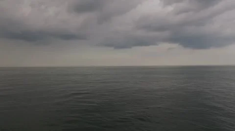 Storm Clouds Over Calm Sea Stock Footage 51445678