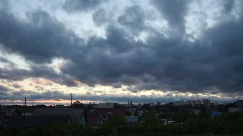 Storm clouds over the city in the evening strong wind after rain Stock Footage 131101344