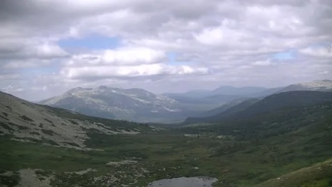 Storm clouds over the colorful mountains. Stock Footage 137598008