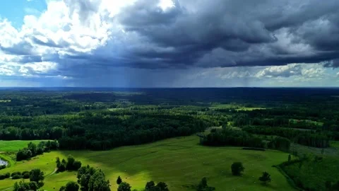 Storm clouds over countryside 스톡 동영상 331025768