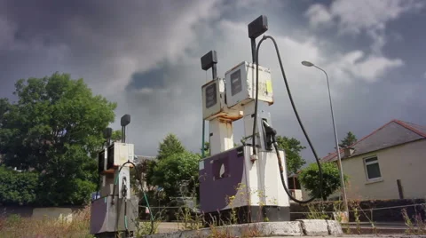Storm Clouds over Discarded Petrol Pumps Stock Footage 52943125