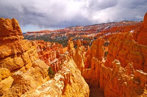 Storm clouds over a dramatic canyon Stockfoto's