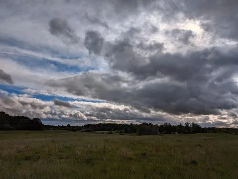 Storm Clouds Over the Field Stock Photos