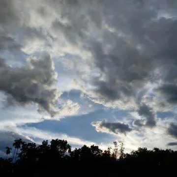 Storm clouds over the field Stock Photos