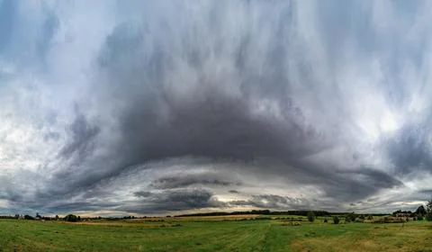 Storm clouds over the fields, Napoleon hat shape Foto stock