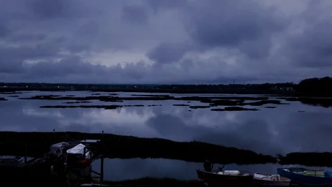 Storm Clouds Over Glass Water Time Lapse Stock Footage 89947751