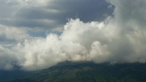 Storm clouds over green mountains, time lapse Stock Footage 79449117