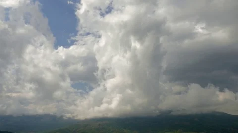 Storm clouds over green mountains Stock Footage 79533283