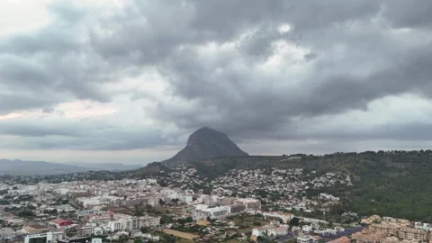Storm Clouds over Javea Town and Montgo Mountain, Costa Blanca Spain Stock Footage 340470448