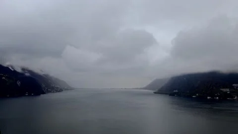 Storm Clouds over Lake Lugano with Mountain Range View Видео 224346850