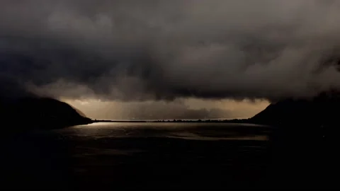 Storm Clouds over Lake Lugano with Mountain Range View and Sunlight Vídeos de archivo 224346967