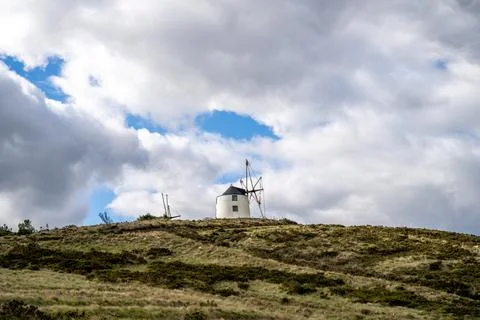 Storm clouds over layered forest hills Stock Photos