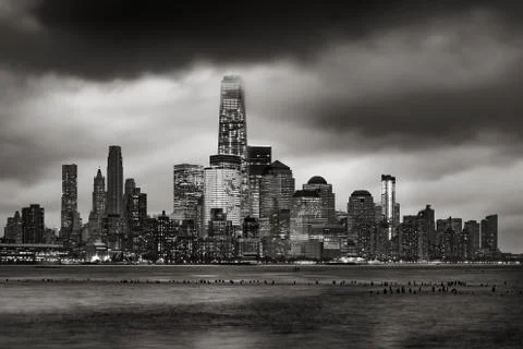 Storm Clouds over Lower Manhattan skyscrapers in Black &amp; White. New York City Stock Photos