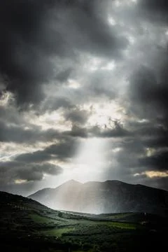 Storm clouds over the mountain Stock Photos
