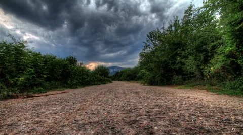 Storm Clouds Over A Mountain Road.  HDR Time Lapse Shot Motorized Slider Stock Footage 26900819