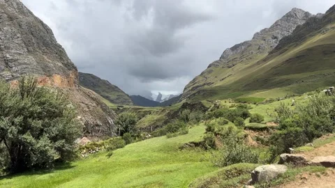Storm Clouds Over Mountain Valley, Cordillera Huayhuash Peru Stock Footage 324528814