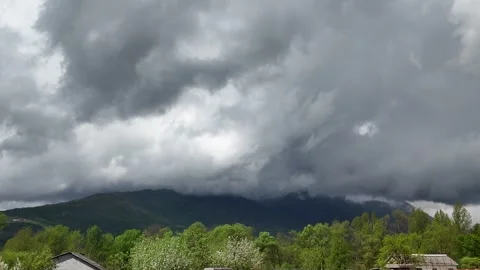 Storm clouds over the mountains. Stock Footage 317679407