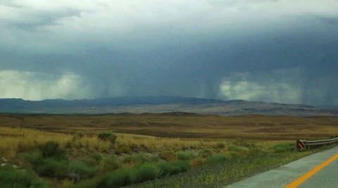Storm Clouds over Mountains near Nevada Highway I-90 Vídeos de archivo 42799331