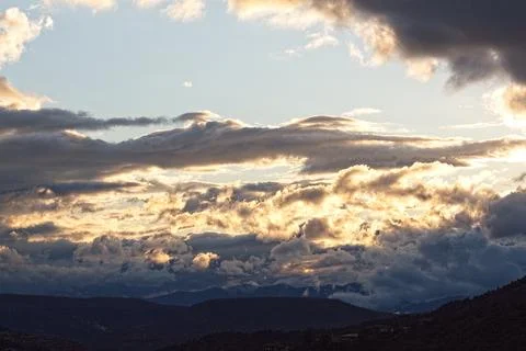 Storm clouds over the mountains. Stock Photos