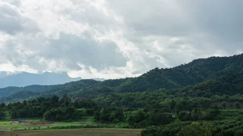 Storm clouds over mountains. Rain is coming and fall on ground Stock Footage 56470142
