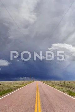 Storm Clouds Over Open Road, Rush, Colorado, Usa