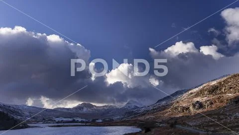 Storm clouds over the peak of Snowdon mountain, North Wales Stock Photos
