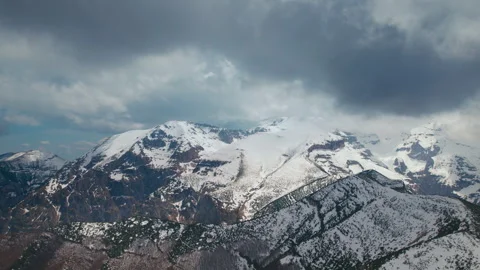 Storm clouds over the peaks with a 4K drone Video stock 240603533
