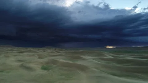 Storm clouds over sand desert 스톡 동영상 159857429