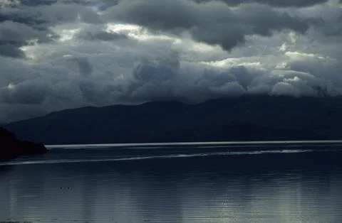 Storm Clouds over a Scottish Loch Stock Photos