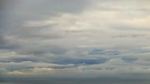 Storm clouds over sea and island Stock Footage 14973176