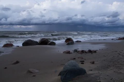 Storm clouds over the sea Stock Photos