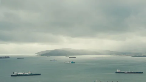 Storm Clouds Over The Strait Of Gibraltar With Anchored Ships Stock Footage 331447473
