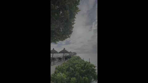 Storm Clouds Over Tropical Beach in Caye Caulker Belize Vídeos de archivo 335241730