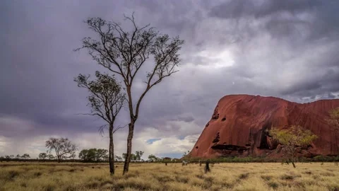 Storm clouds over Uluru Stock Footage 130229230