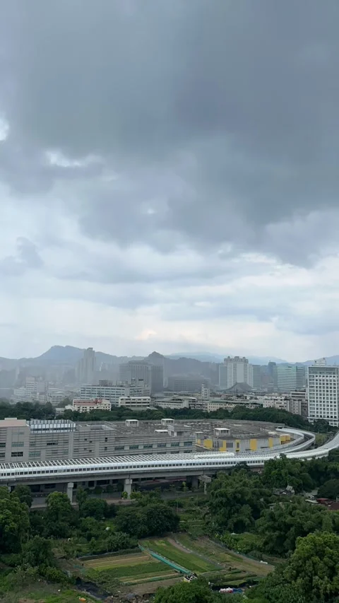 Storm Clouds Over Urban Highway And Mountain Skyline Stock Footage 340322679