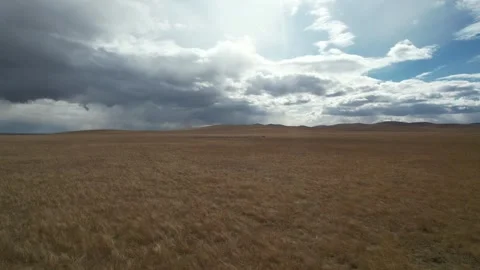 Storm Clouds Over Vast Grassland in Inner Mongolia, China Stock Footage 344035845