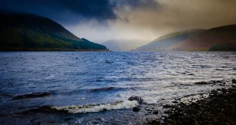 Storm clouds over a wild and windy St Mary's Loch in the Scottish Borders Stock Photos