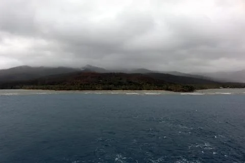 Storm clouds overlooking island Stock Photos