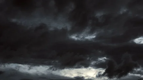 Storm clouds passing over city skyline Stock Footage 75920053